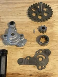 2014 - 2017 Yamaha YZ450F Complete Oem Oil Pump Drive Gear Assembly Used. Price: $50.00.
